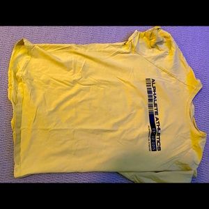 Yellow Alphalete shirt